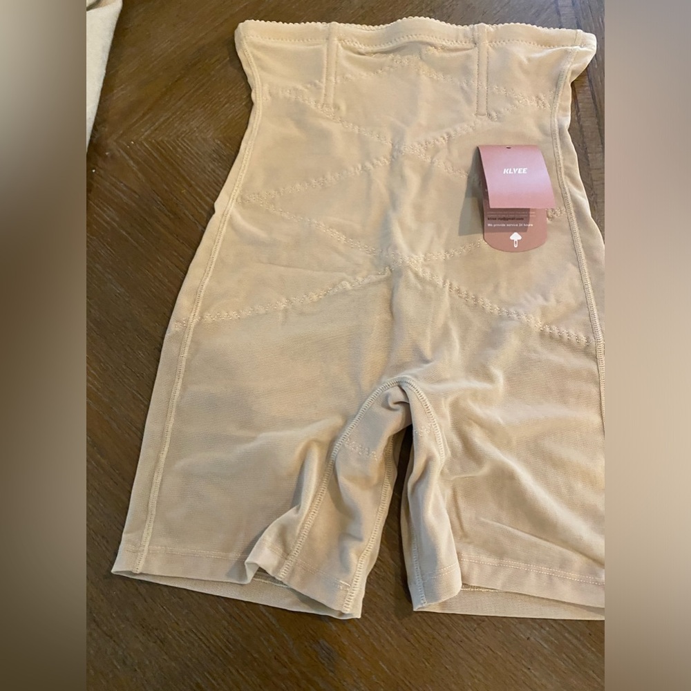 Woman’s shape wear size Large. Beige. New with tags